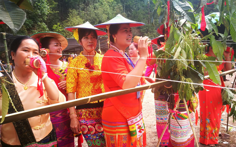 Caihua Festival or Flowers Picking Festival of Dai Ethnic Minority in Santaishan Town of Mangshi City, Dehong