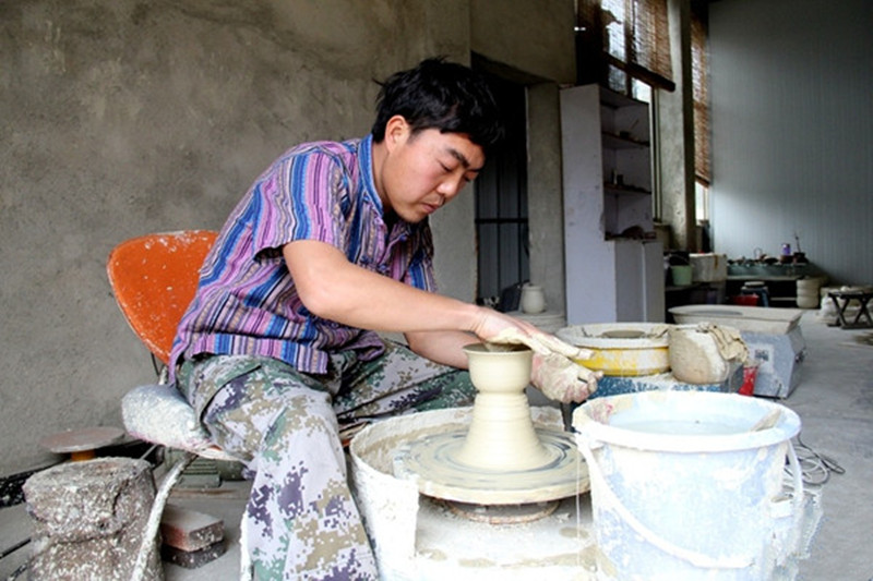 Purple Pottery Firing Skill Protection in Wantao Village of Jianshui County, Honghe